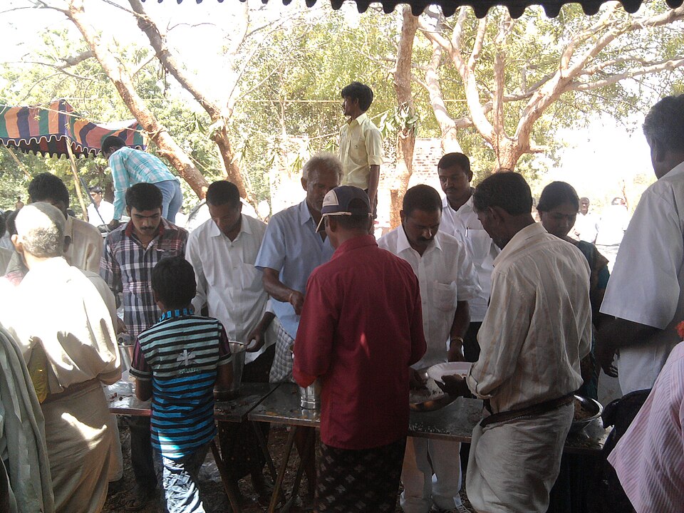 Devotees receiving prasad at the temple