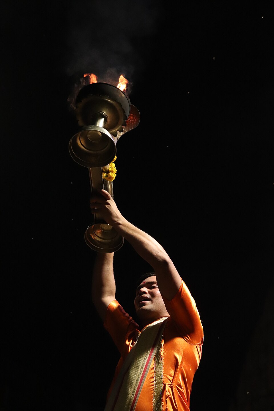 Aarti lamp raised in devotion
