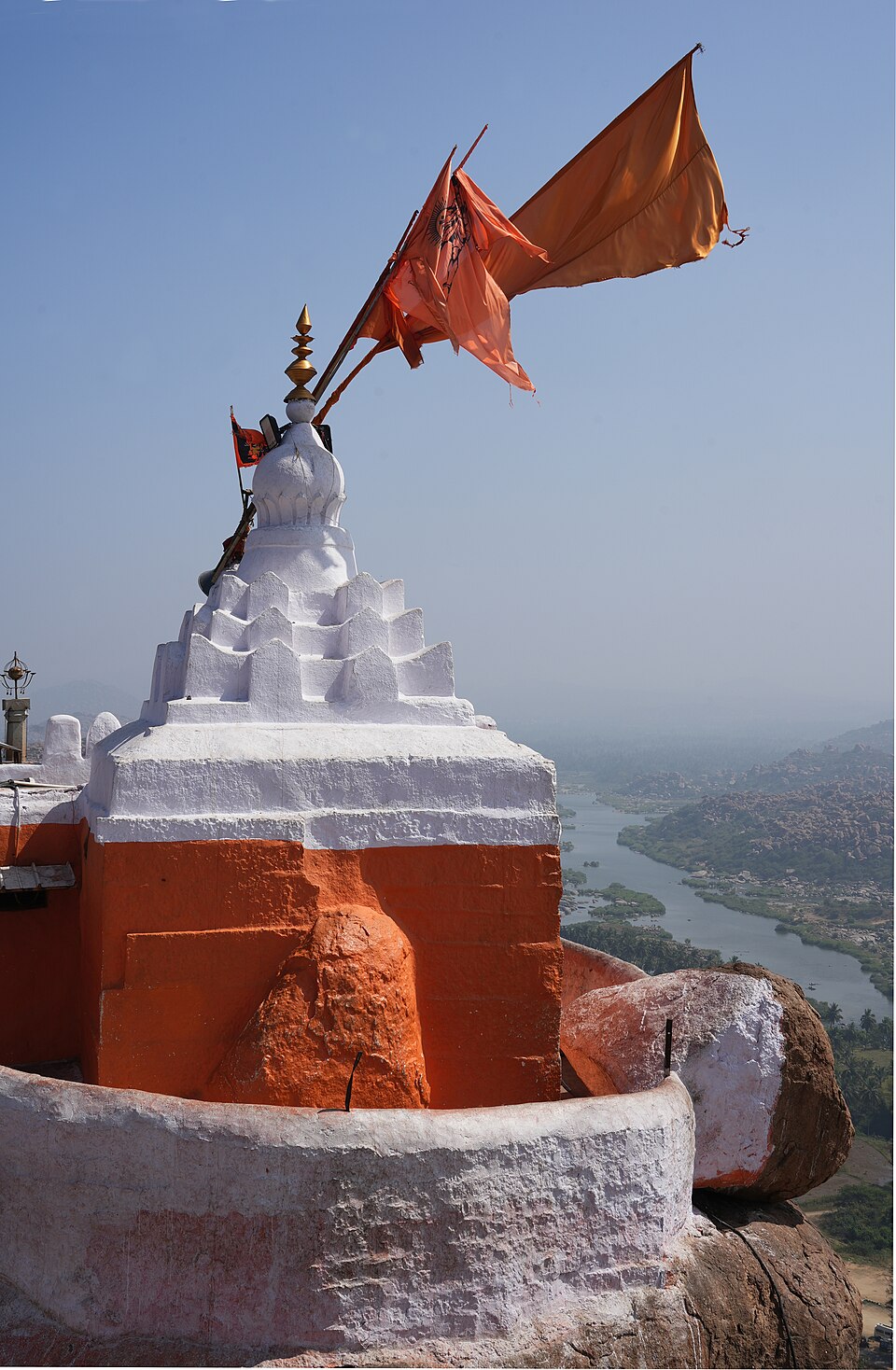 Hilltop Hanuman shrine with saffron flags